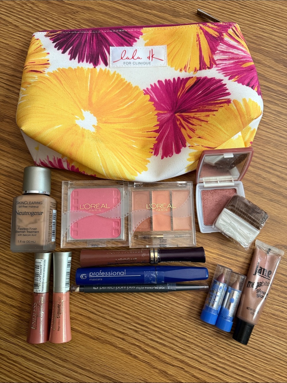 Neutrogena Makeup Bag with Pink & Yellow Floral Design 13 piece essentials Kit